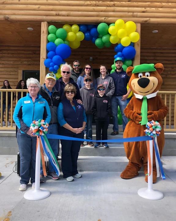 Family at store grand opening 2023