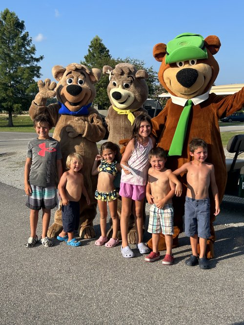 Children celebrating with the bears